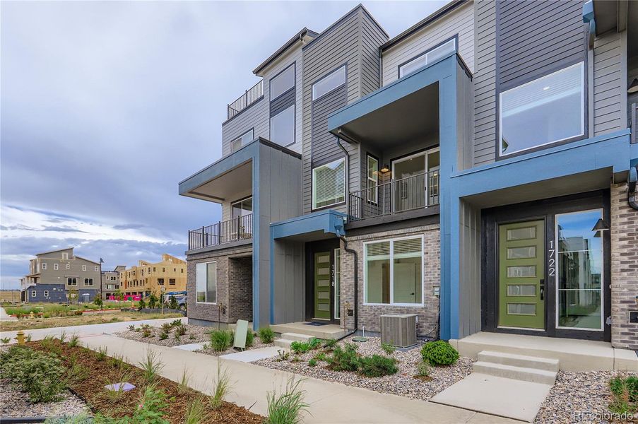 Front exterior of a new home in , Broomfield, CO, highlighting curb appeal (Image 2).