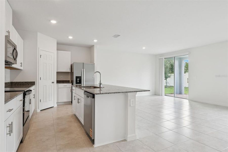 Furnished interior view inside a new home in Bradbury Creek - Signature Series, Haines City (Image 9).