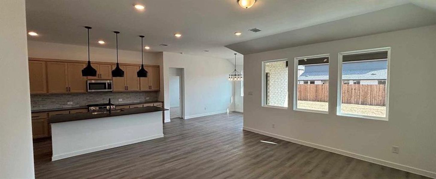 Open Kitchen-Living-Dining Room Construction Progress featuring the Foundry Collection
