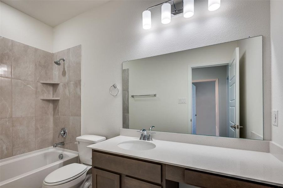 Bathroom with washtub / shower combination and vanity Bathroom with washtub / shower combination and vanity