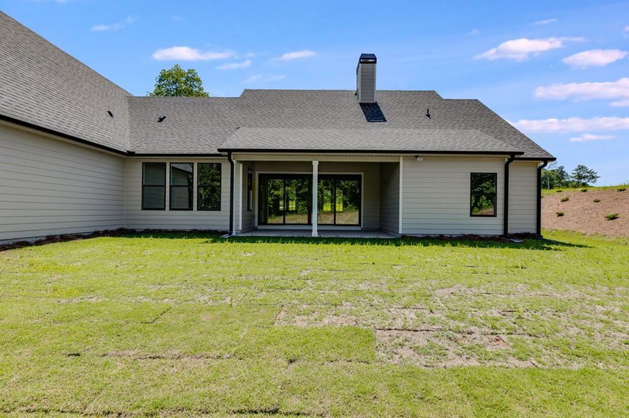 Exterior details and patio area of a home in Harmon Springs, Carrollton (Image 26).