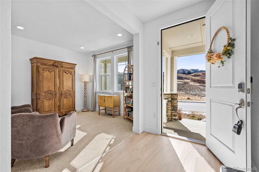 Sunlit, bright entryway and office space