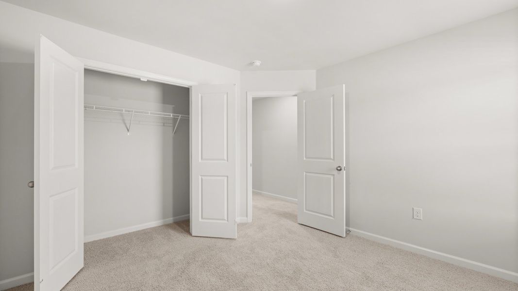 Representative unfurnished interior of a home built from the Somerset by D.R. Horton in Highland Hills, Graniteville (Image 23).