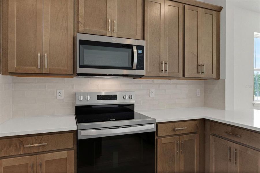 Furnished interior view inside a new home in Crossroads at Kelly Park, Apopka (Image 8).