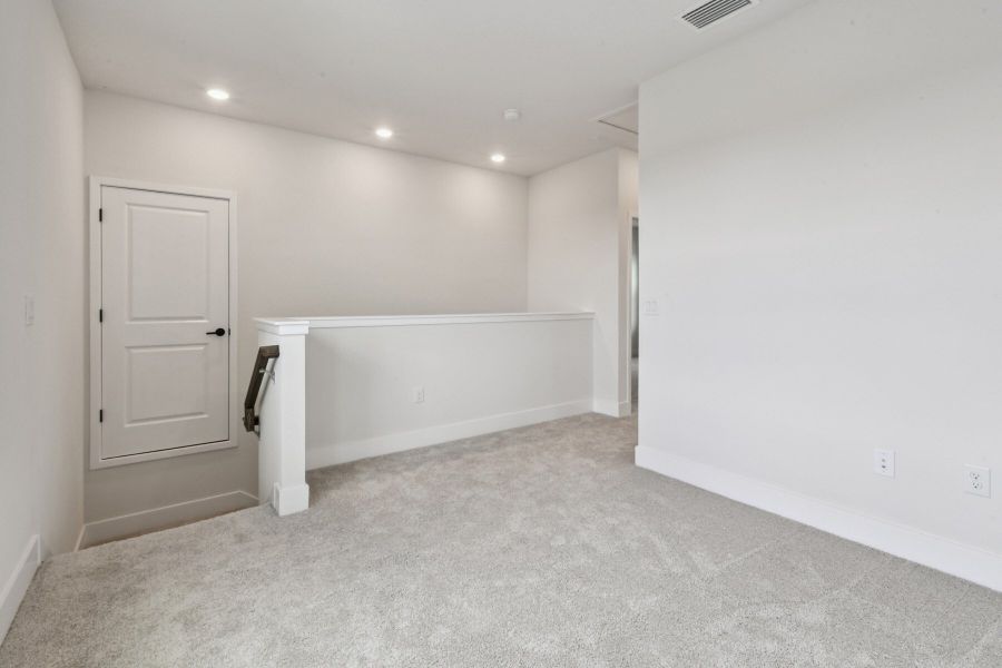 Representative unfurnished interior of a home built from the The Lauderdale by David Weekley Homes in Chapel Crossings - Garden Series, Wesley Chapel (Image 9).