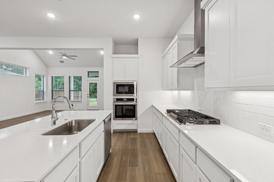 Kitchen in the Picasso II home plan by Trophy Signature Homes – REPRESENTATIVE PHOTO Kitchen in the Picasso II home plan by Trophy Signature Homes – REPRESENTATIVE PHOTO