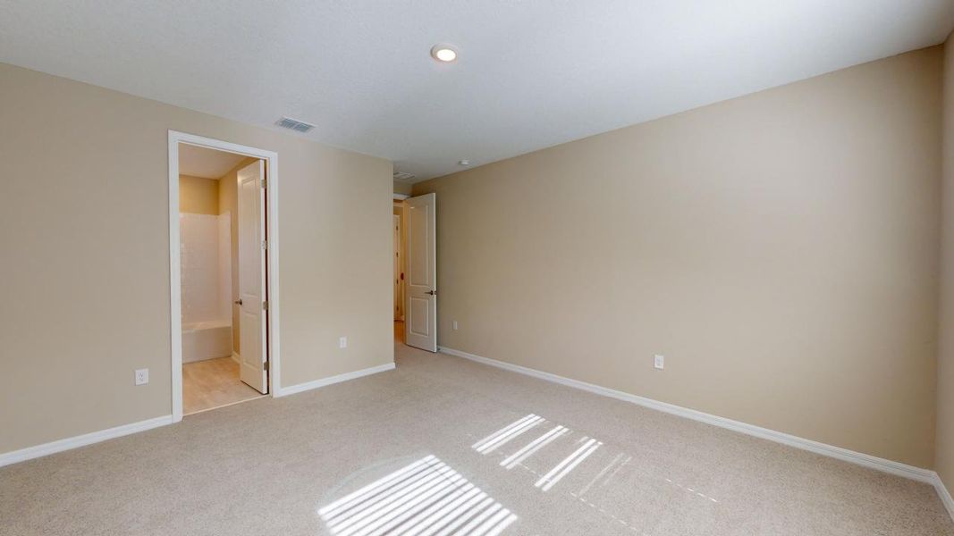 Representative unfurnished interior of a home built from the Barbuda by Taylor Morrison in Headwaters at Lofton Creek, Yulee (Image 49).