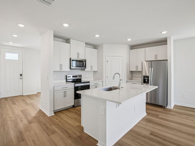 Furnished interior view inside a new home in Oakfield Trails - Classic Series, Parrish (Image 5).