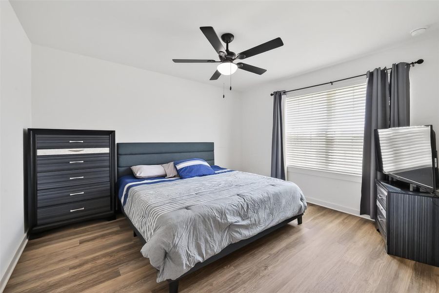 Secondary bedroom #2 featuring a walk-in closet for added storage