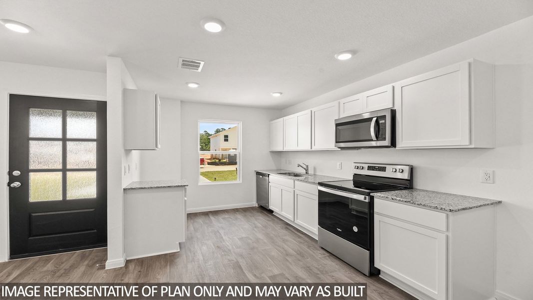 Furnished interior view inside a new home in Castles Edge, Willis (Image 4).