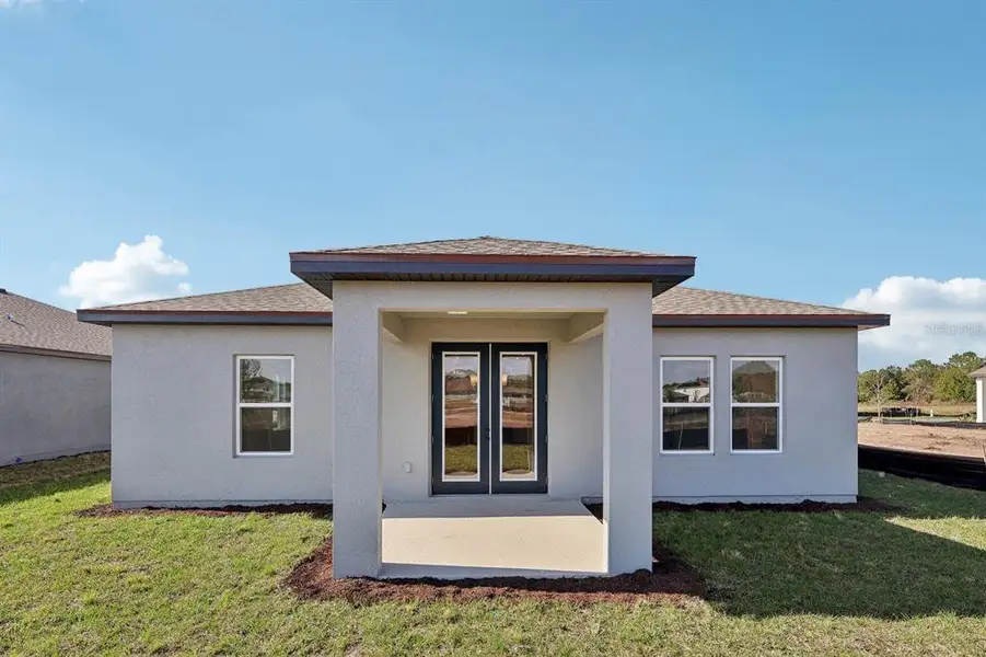 Exterior details and patio area of a home in Tyson Reserve, St. Cloud (Image 16).