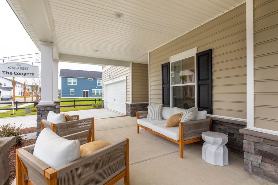 Exterior details and patio area of a home in Sweetgrass at Summers Corner: Coastal Collection, Summerville (Image 2).