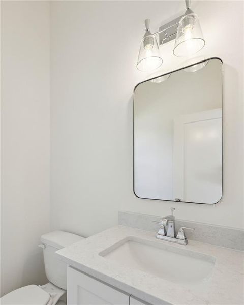 Bathroom with vanity and toilet