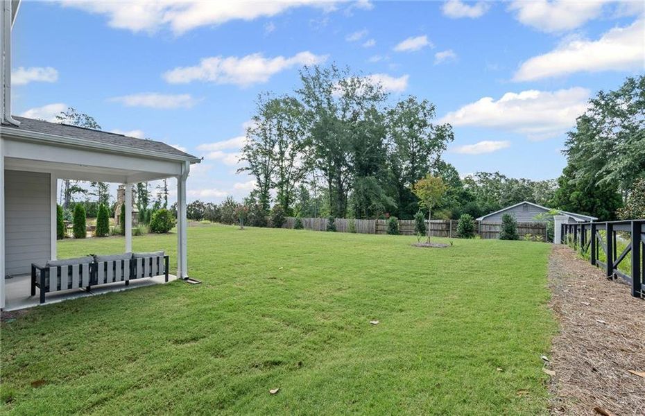 Exterior details and patio area of a home in Creekside at Skelton, Jefferson (Image 20).