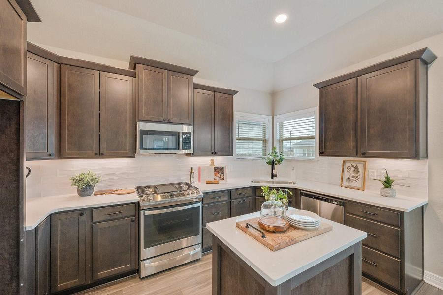 **Photos are sample photos of similar plan. Colors and features might vary**