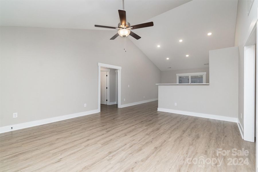 Luxury Vinyl Plank flooring accents the Kitchen and Family Room