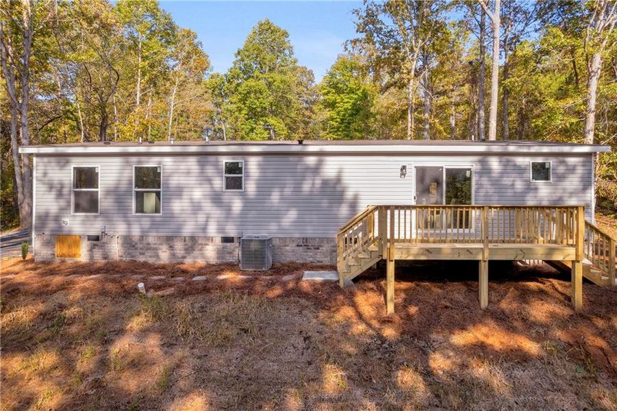 Exterior details and patio area of a home in , Ball Ground (Image 29).