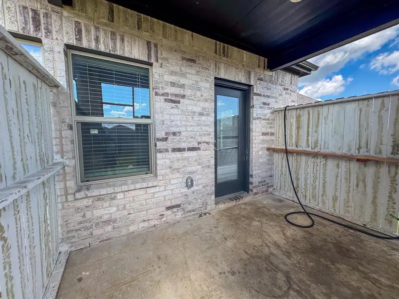Exterior details and patio area of a home in Stonehaven, Seagoville (Image 4). Exterior details and patio area of a home in Stonehaven, Seagoville (Image 4).