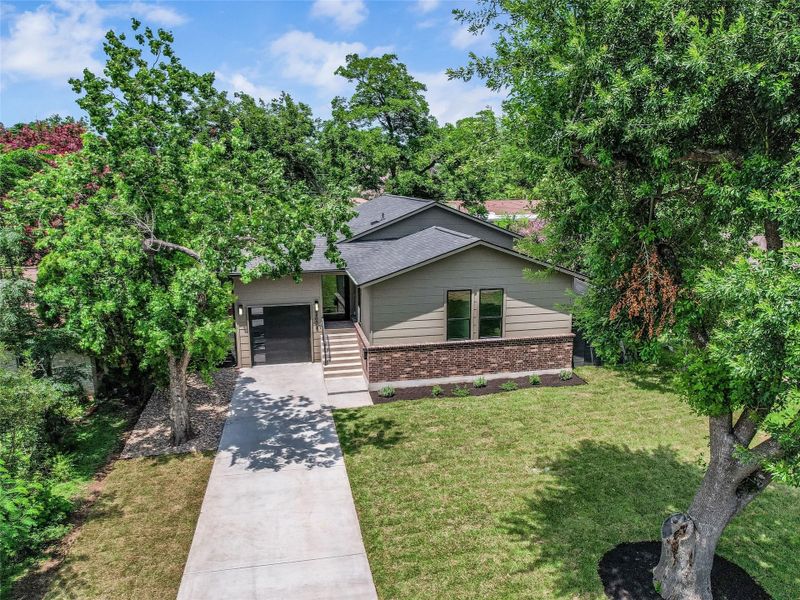 Front exterior of a new home in , Austin, TX, highlighting curb appeal (Image 16).