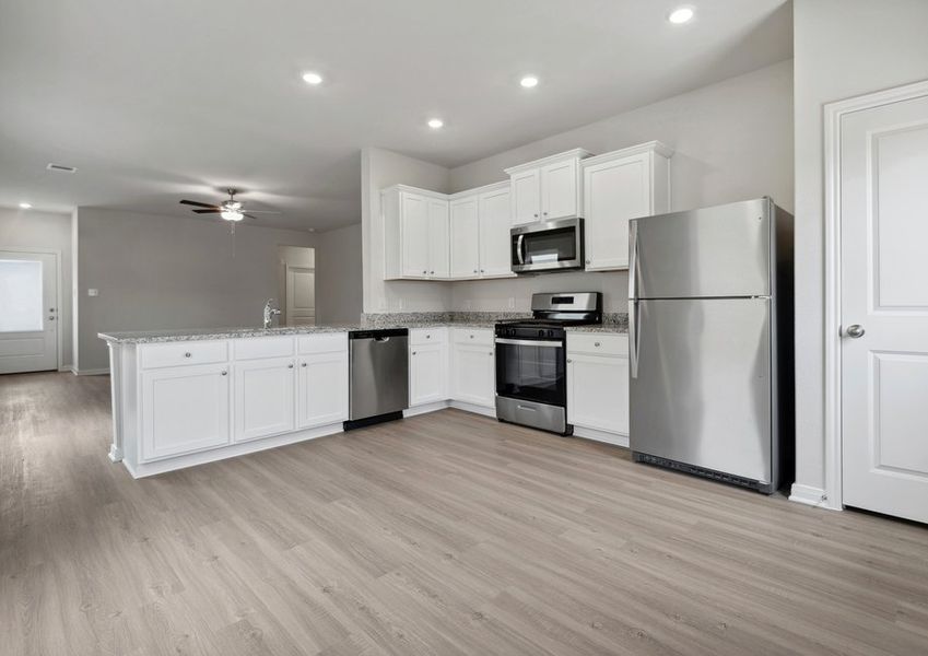 Kitchen with stainless steel appliances and white cabinets Kitchen with stainless steel appliances and white cabinets