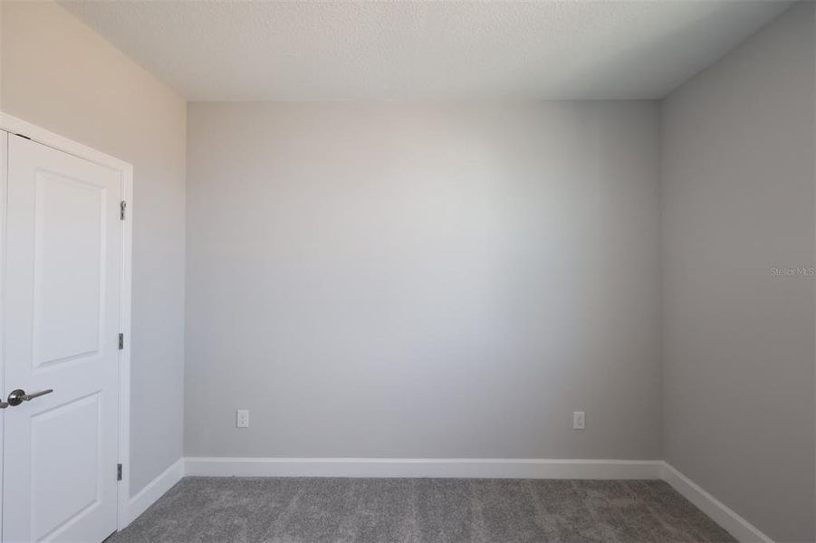 Spacious, unfurnished interior of a new home in Lake Star at Ovation, Winter Garden (Image 3).