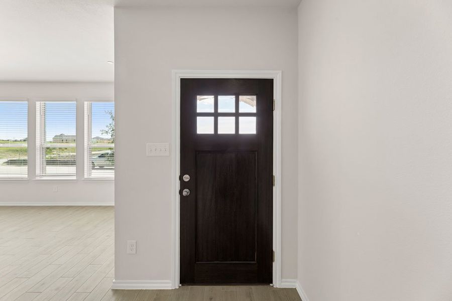 Front exterior of a new home in Creekshaw, Royse City, TX, highlighting curb appeal (Image 5).