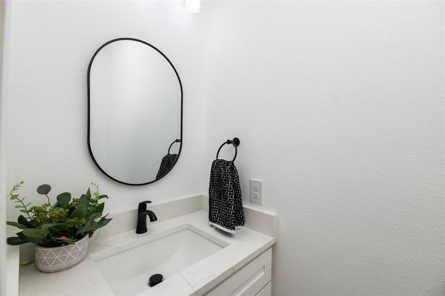 Bathroom featuring vanity Bathroom featuring vanity