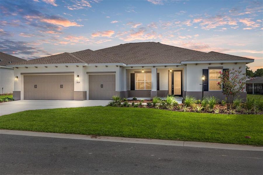 Front exterior of a new home in On Top of the World Communities, Ocala, FL, highlighting curb appeal (Image 1).