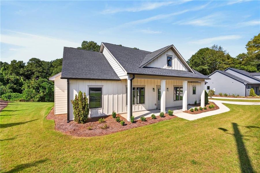 Front exterior of a new home in , Monroe, GA, highlighting curb appeal (Image 20).