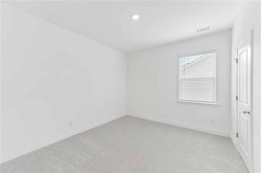 Spacious, unfurnished interior of a new home in Bailey Fence, Dacula (Image 22).