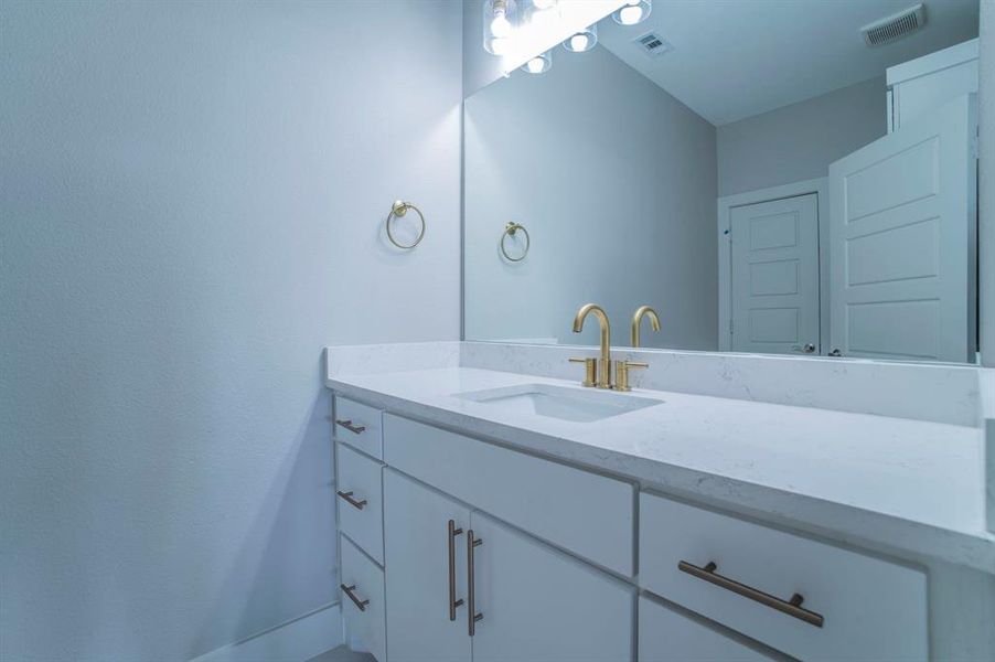 Bathroom featuring vanity