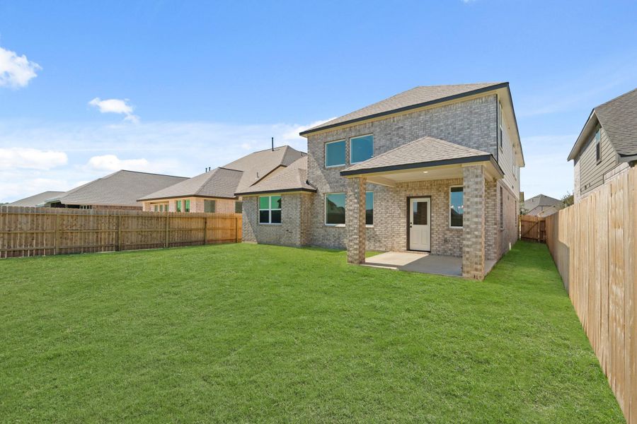 This backyard is perfect for family gatherings, social events, or simply unwinding in the fresh air. This backyard is perfect for family gatherings, social events, or simply unwinding in the fresh air.
