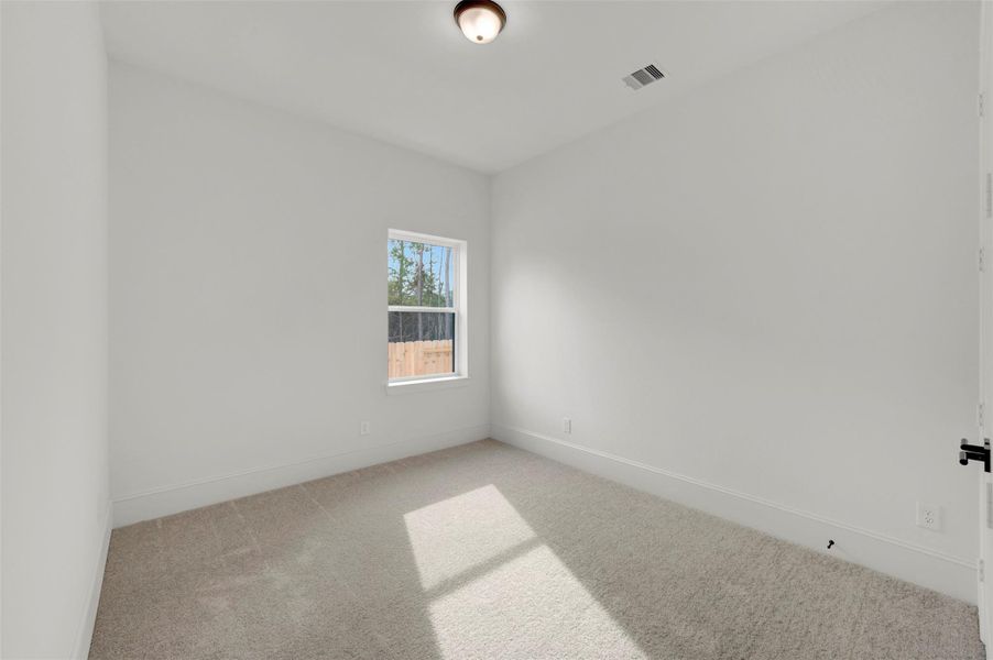 Spacious, unfurnished interior of a new home in The Woodlands Hills - Premier Collection, Willis (Image 20).