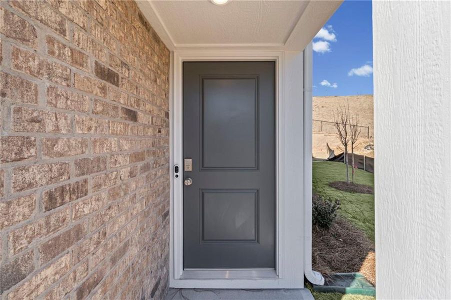 Exterior details and patio area of a home in Villas at Gold Creek, Dawsonville (Image 25).