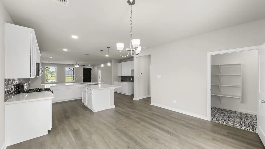 Furnished interior view inside a new home in Waterscape, Royse City (Image 11).