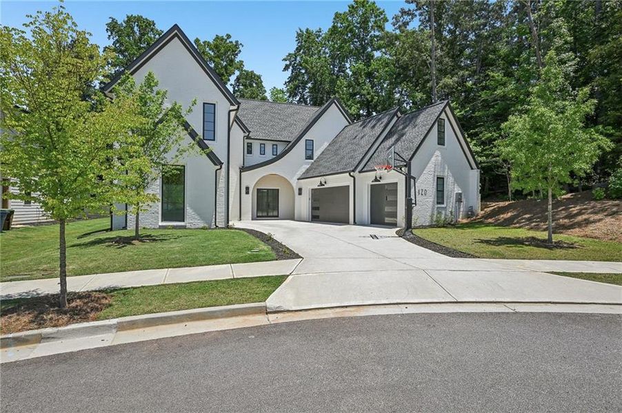 Front exterior of a new home in , Alpharetta, GA, highlighting curb appeal (Image 34). Front exterior of a new home in , Alpharetta, GA, highlighting curb appeal (Image 34).