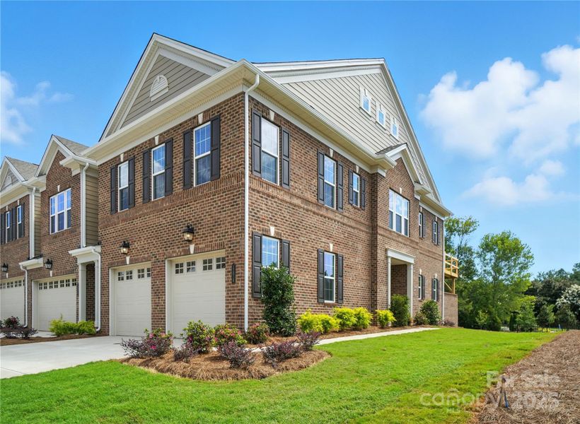 Duke has side entrance with view of balcony and deck.   Similar to Subject home Representation only.