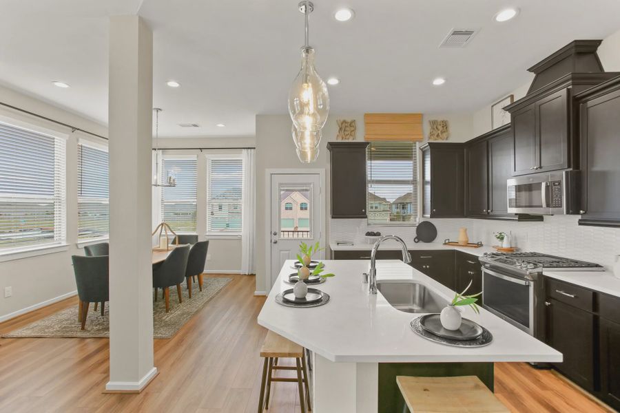 Representative furnished interior of a home built from the Summerhouse 2 by Chesmar Homes in Meridiana Townhomes, Iowa Colony (Image 10).