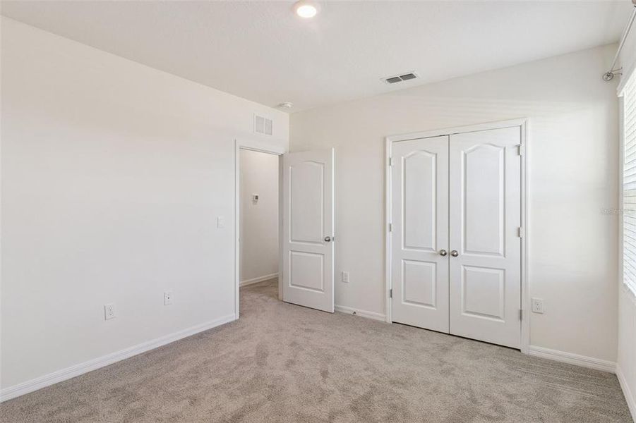 Spacious, unfurnished interior of a new home in Harmony at Lake Eloise, Winter Haven (Image 20).