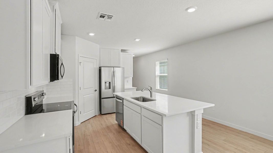 Furnished interior view inside a new home in Venetian Grove, Vero Beach (Image 5).