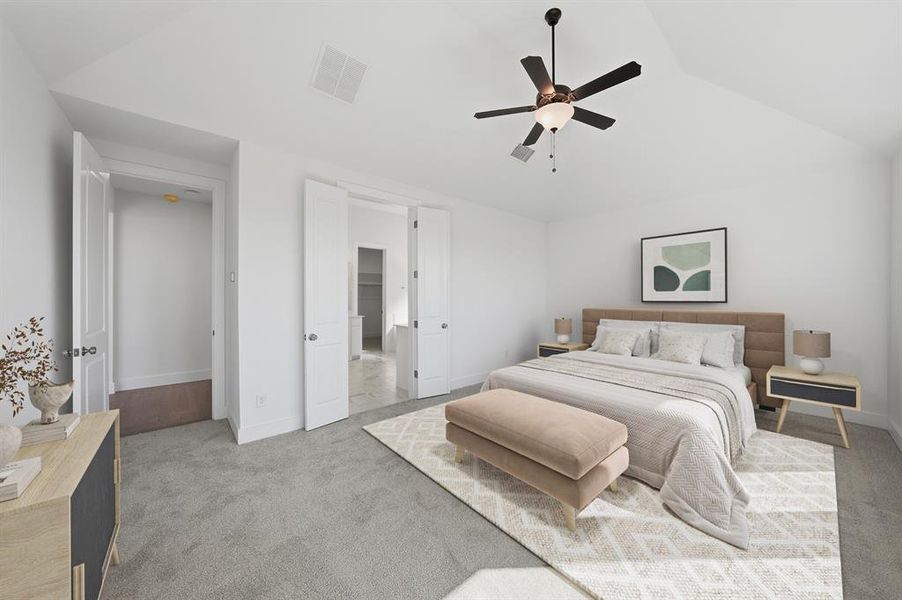 Bedroom with carpet flooring, a ceiling fan, and vaulted ceiling Bedroom with carpet flooring, a ceiling fan, and vaulted ceiling