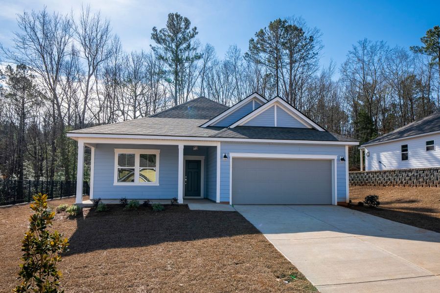 Front exterior of a new home in Carriage Estates, Lexington, SC, highlighting curb appeal (Image 22). Front exterior of a new home in Carriage Estates, Lexington, SC, highlighting curb appeal (Image 22).
