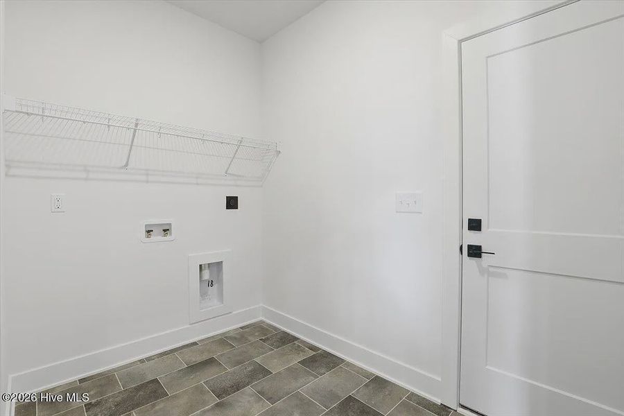 Spacious, unfurnished interior of a new home in Wood Creek Landing, Leland (Image 13). Spacious, unfurnished interior of a new home in Wood Creek Landing, Leland (Image 13).