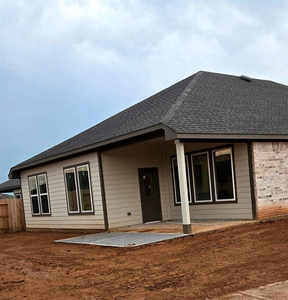 Exterior details and patio area of a home in Sunterra, Katy (Image 4).