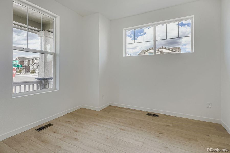Spacious, unfurnished interior of a new home in Sky Ranch: Pioneer Collection, Watkins (Image 11).