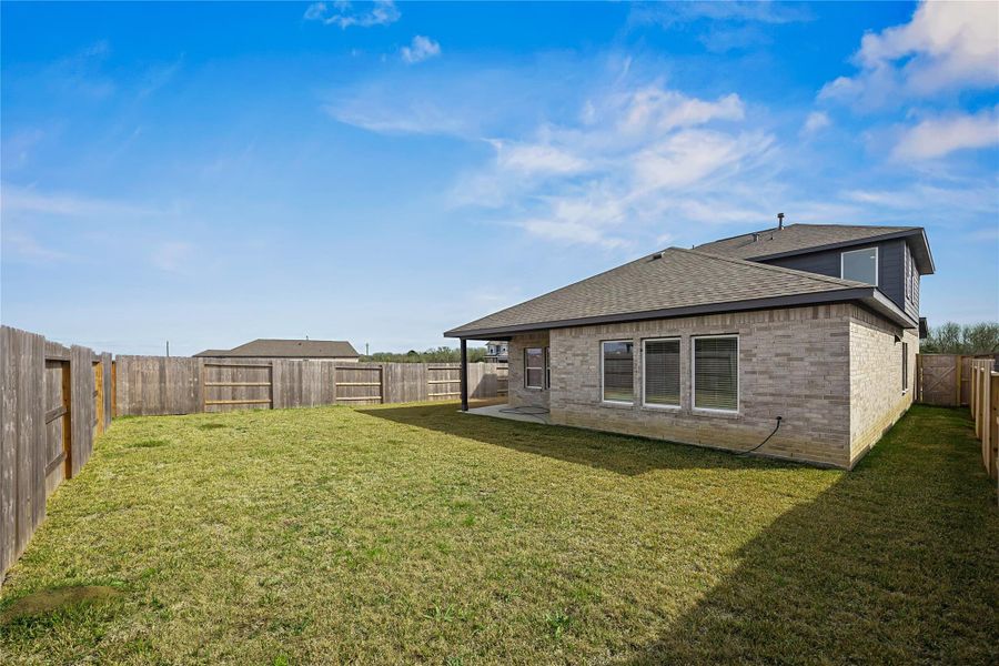 Exterior details and patio area of a home in River Ranch Meadows, Dayton (Image 21).