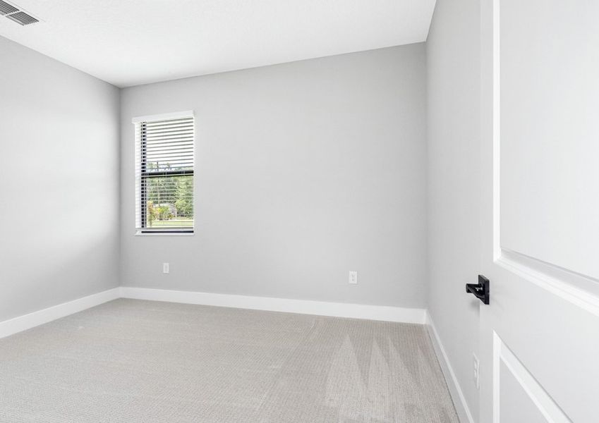 Each secondary bedroom includes carpet, windows and a closet