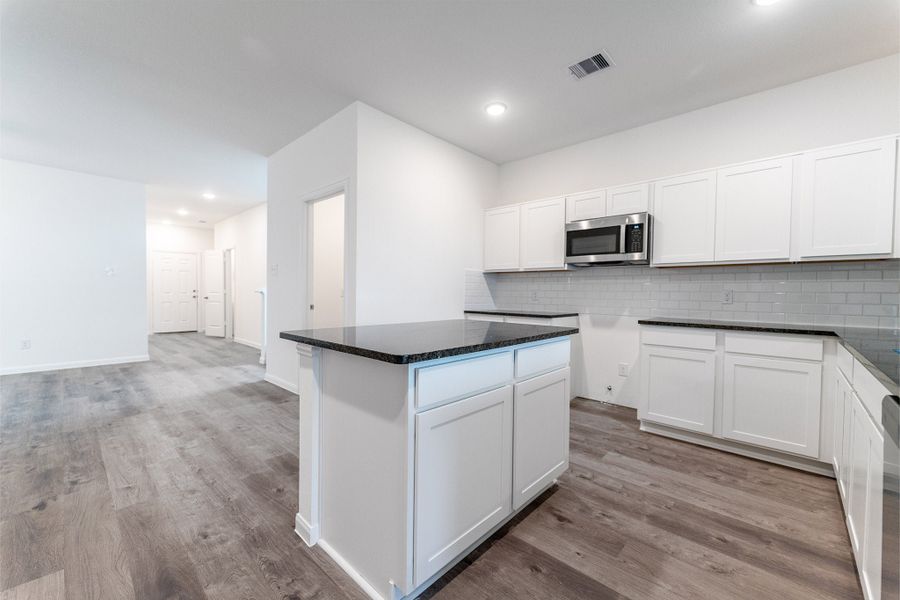 Furnished interior view inside a new home in Sweetgrass Village, Crosby (Image 6).