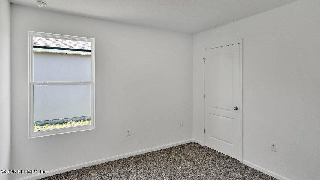 Spacious, unfurnished interior of a new home in Grand Reserve, Bunnell (Image 23).