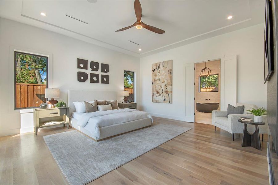 Bedroom with recessed lighting, light wood finished floors, and a ceiling fan
